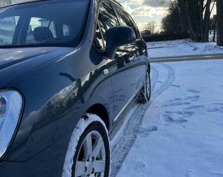 Синій Кіа Каренс, об'ємом двигуна 2 л та пробігом 233 тис. км за 7700 $, фото 2 на Automoto.ua