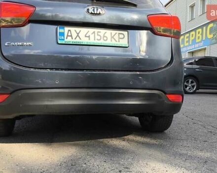 Синій Кіа Каренс, об'ємом двигуна 2 л та пробігом 228 тис. км за 10200 $, фото 5 на Automoto.ua