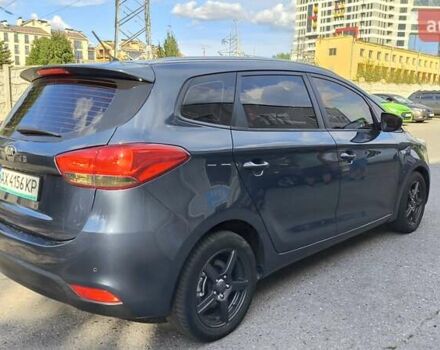 Синій Кіа Каренс, об'ємом двигуна 2 л та пробігом 228 тис. км за 10200 $, фото 4 на Automoto.ua