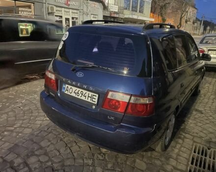 Синий Киа Каренс, объемом двигателя 2 л и пробегом 260 тыс. км за 3200 $, фото 4 на Automoto.ua