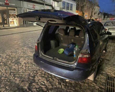 Синий Киа Каренс, объемом двигателя 2 л и пробегом 260 тыс. км за 3200 $, фото 5 на Automoto.ua