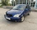 Синий Киа Каренс, объемом двигателя 1.8 л и пробегом 126 тыс. км за 3300 $, фото 1 на Automoto.ua