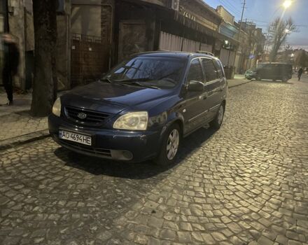 Синий Киа Каренс, объемом двигателя 2 л и пробегом 260 тыс. км за 3200 $, фото 1 на Automoto.ua