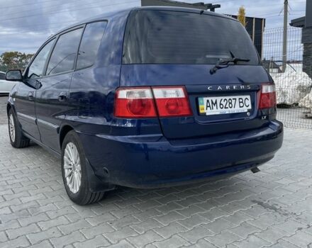 Синий Киа Каренс, объемом двигателя 2 л и пробегом 187 тыс. км за 3800 $, фото 1 на Automoto.ua