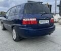 Синий Киа Каренс, объемом двигателя 2 л и пробегом 187 тыс. км за 3800 $, фото 1 на Automoto.ua