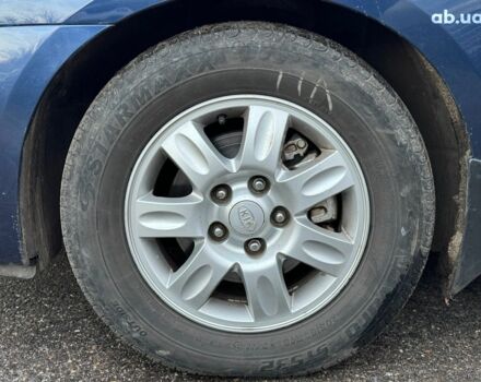 Синий Киа Каренс, объемом двигателя 2 л и пробегом 234 тыс. км за 6990 $, фото 9 на Automoto.ua