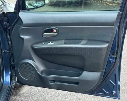 Синий Киа Каренс, объемом двигателя 2 л и пробегом 234 тыс. км за 6990 $, фото 21 на Automoto.ua