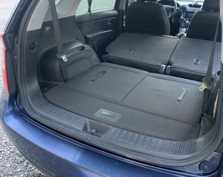 Синий Киа Каренс, объемом двигателя 2 л и пробегом 234 тыс. км за 6500 $, фото 4 на Automoto.ua