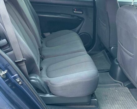 Синий Киа Каренс, объемом двигателя 2 л и пробегом 234 тыс. км за 6990 $, фото 19 на Automoto.ua