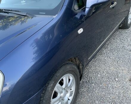 Синий Киа Каренс, объемом двигателя 2 л и пробегом 234 тыс. км за 6500 $, фото 1 на Automoto.ua