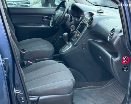 Синий Киа Каренс, объемом двигателя 2 л и пробегом 234 тыс. км за 6990 $, фото 22 на Automoto.ua