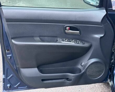 Синий Киа Каренс, объемом двигателя 2 л и пробегом 234 тыс. км за 6990 $, фото 10 на Automoto.ua