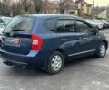 Синий Киа Каренс, объемом двигателя 2 л и пробегом 234 тыс. км за 5790 $, фото 5 на Automoto.ua