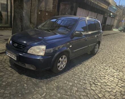 Синий Киа Каренс, объемом двигателя 2 л и пробегом 260 тыс. км за 2900 $, фото 1 на Automoto.ua