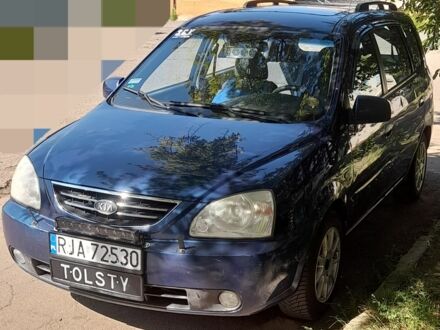 Синий Киа Каренс, объемом двигателя 1.8 л и пробегом 290 тыс. км за 1667 $, фото 1 на Automoto.ua
