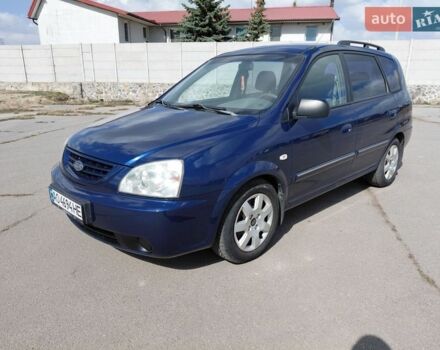 Синий Киа Каренс, объемом двигателя 20 л и пробегом 265 тыс. км за 4200 $, фото 1 на Automoto.ua
