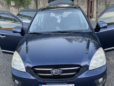 Синий Киа Каренс, объемом двигателя 2 л и пробегом 234 тыс. км за 6500 $, фото 1 на Automoto.ua