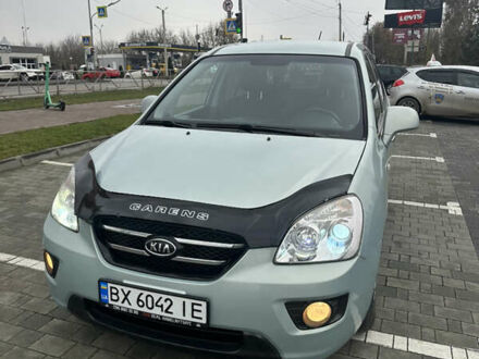 Синий Киа Каренс, объемом двигателя 2 л и пробегом 190 тыс. км за 5950 $, фото 1 на Automoto.ua