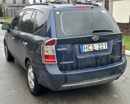 Синій Кіа Каренс, об'ємом двигуна 2 л та пробігом 280 тис. км за 2600 $, фото 1 на Automoto.ua