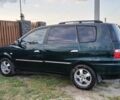 Зелений Кіа Каренс, об'ємом двигуна 1.8 л та пробігом 300 тис. км за 4300 $, фото 4 на Automoto.ua
