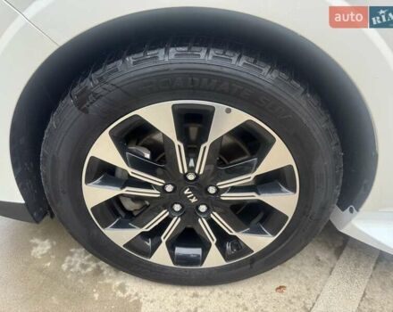 Белый Киа Карнивал, объемом двигателя 2.15 л и пробегом 78 тыс. км за 32300 $, фото 7 на Automoto.ua