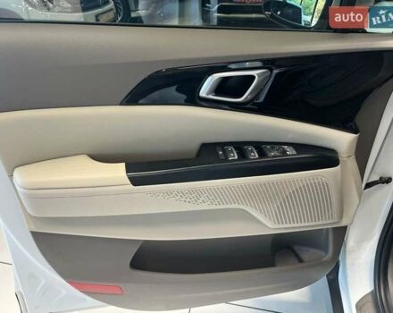 Білий Кіа Карнівал, об'ємом двигуна 2.15 л та пробігом 70 тис. км за 42500 $, фото 12 на Automoto.ua