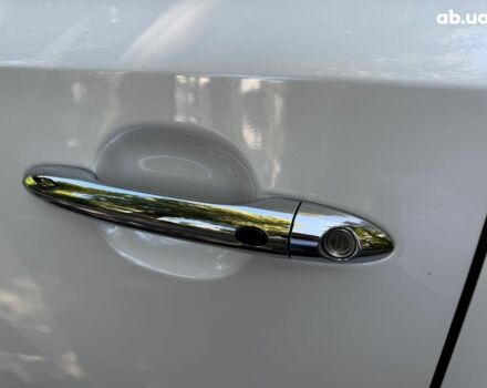 Белый Киа Карнивал, объемом двигателя 2.2 л и пробегом 145 тыс. км за 30490 $, фото 13 на Automoto.ua