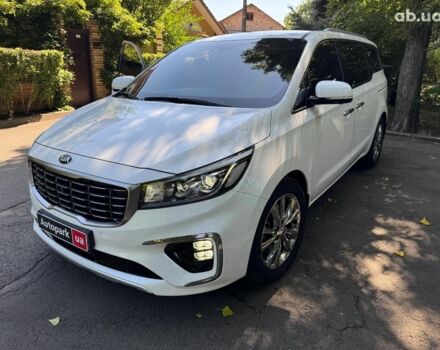 Белый Киа Карнивал, объемом двигателя 2.2 л и пробегом 145 тыс. км за 30490 $, фото 1 на Automoto.ua