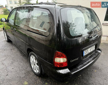 Черный Киа Карнивал, объемом двигателя 2.9 л и пробегом 250 тыс. км за 2100 $, фото 3 на Automoto.ua