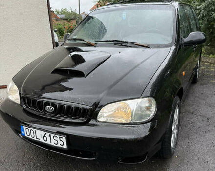 Черный Киа Карнивал, объемом двигателя 2.9 л и пробегом 250 тыс. км за 2100 $, фото 1 на Automoto.ua