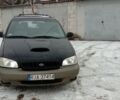 Черный Киа Карнивал, объемом двигателя 2.9 л и пробегом 340 тыс. км за 3200 $, фото 1 на Automoto.ua
