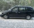 Черный Киа Карнивал, объемом двигателя 2.9 л и пробегом 235 тыс. км за 1250 $, фото 1 на Automoto.ua