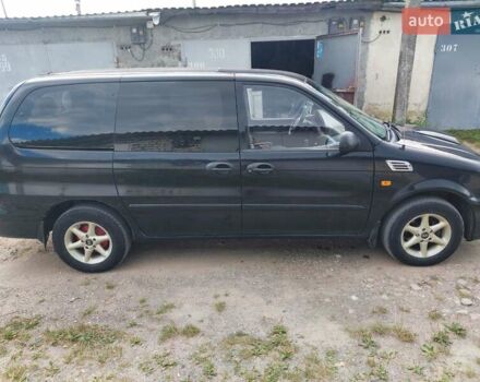 Черный Киа Карнивал, объемом двигателя 2.9 л и пробегом 294 тыс. км за 4000 $, фото 6 на Automoto.ua