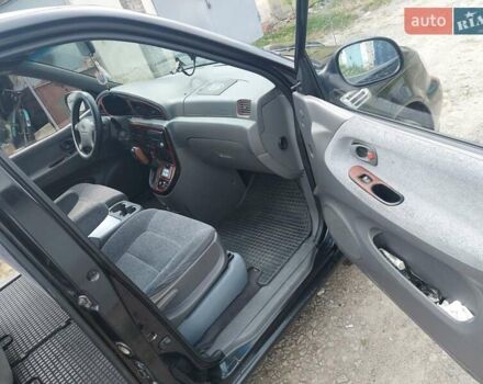 Черный Киа Карнивал, объемом двигателя 2.9 л и пробегом 294 тыс. км за 4000 $, фото 16 на Automoto.ua