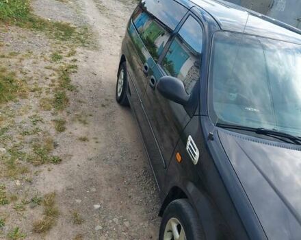 Черный Киа Карнивал, объемом двигателя 2.9 л и пробегом 294 тыс. км за 4000 $, фото 4 на Automoto.ua