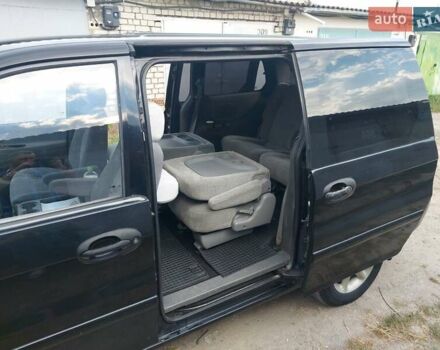 Черный Киа Карнивал, объемом двигателя 2.9 л и пробегом 294 тыс. км за 4000 $, фото 14 на Automoto.ua