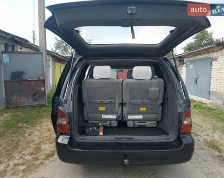 Черный Киа Карнивал, объемом двигателя 2.9 л и пробегом 294 тыс. км за 4000 $, фото 19 на Automoto.ua