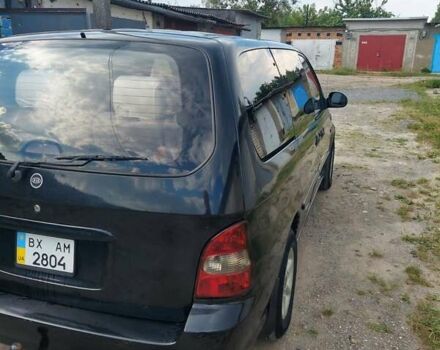 Черный Киа Карнивал, объемом двигателя 2.9 л и пробегом 294 тыс. км за 4000 $, фото 7 на Automoto.ua