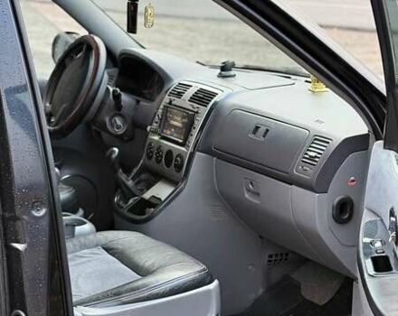 Черный Киа Карнивал, объемом двигателя 2.9 л и пробегом 270 тыс. км за 3000 $, фото 4 на Automoto.ua