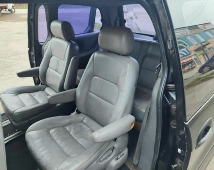 Черный Киа Карнивал, объемом двигателя 2.9 л и пробегом 260 тыс. км за 1500 $, фото 8 на Automoto.ua