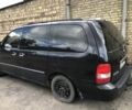Черный Киа Карнивал, объемом двигателя 2.9 л и пробегом 200 тыс. км за 2000 $, фото 1 на Automoto.ua