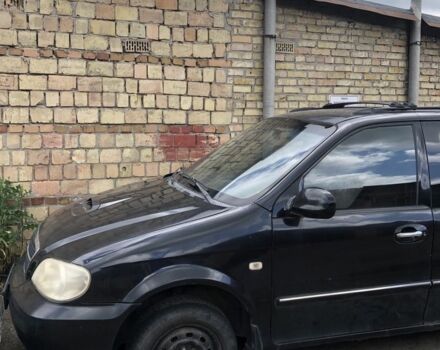 Черный Киа Карнивал, объемом двигателя 2.9 л и пробегом 200 тыс. км за 2000 $, фото 2 на Automoto.ua