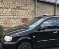 Черный Киа Карнивал, объемом двигателя 2.9 л и пробегом 200 тыс. км за 2000 $, фото 2 на Automoto.ua