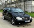 Черный Киа Карнивал, объемом двигателя 2.9 л и пробегом 240 тыс. км за 2450 $, фото 1 на Automoto.ua