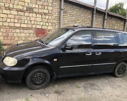 Черный Киа Карнивал, объемом двигателя 2.9 л и пробегом 200 тыс. км за 2000 $, фото 1 на Automoto.ua