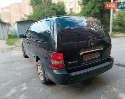 Черный Киа Карнивал, объемом двигателя 2.9 л и пробегом 220 тыс. км за 2900 $, фото 5 на Automoto.ua