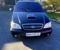 Черный Киа Карнивал, объемом двигателя 2.9 л и пробегом 388 тыс. км за 3200 $, фото 1 на Automoto.ua