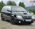 Черный Киа Карнивал, объемом двигателя 2.9 л и пробегом 420 тыс. км за 2999 $, фото 1 на Automoto.ua