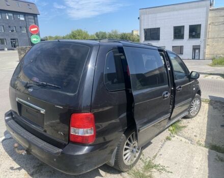 Киа Карнивал 2004 в Ровно на Automoto.ua Черный Киа Карнивал, объемом двигателя 2.9 л и пробегом 300 тыс. км за 2100 $, фото 3 на Automoto.ua