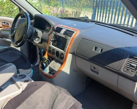 Черный Киа Карнивал, объемом двигателя 2.9 л и пробегом 300 тыс. км за 4600 $, фото 5 на Automoto.ua